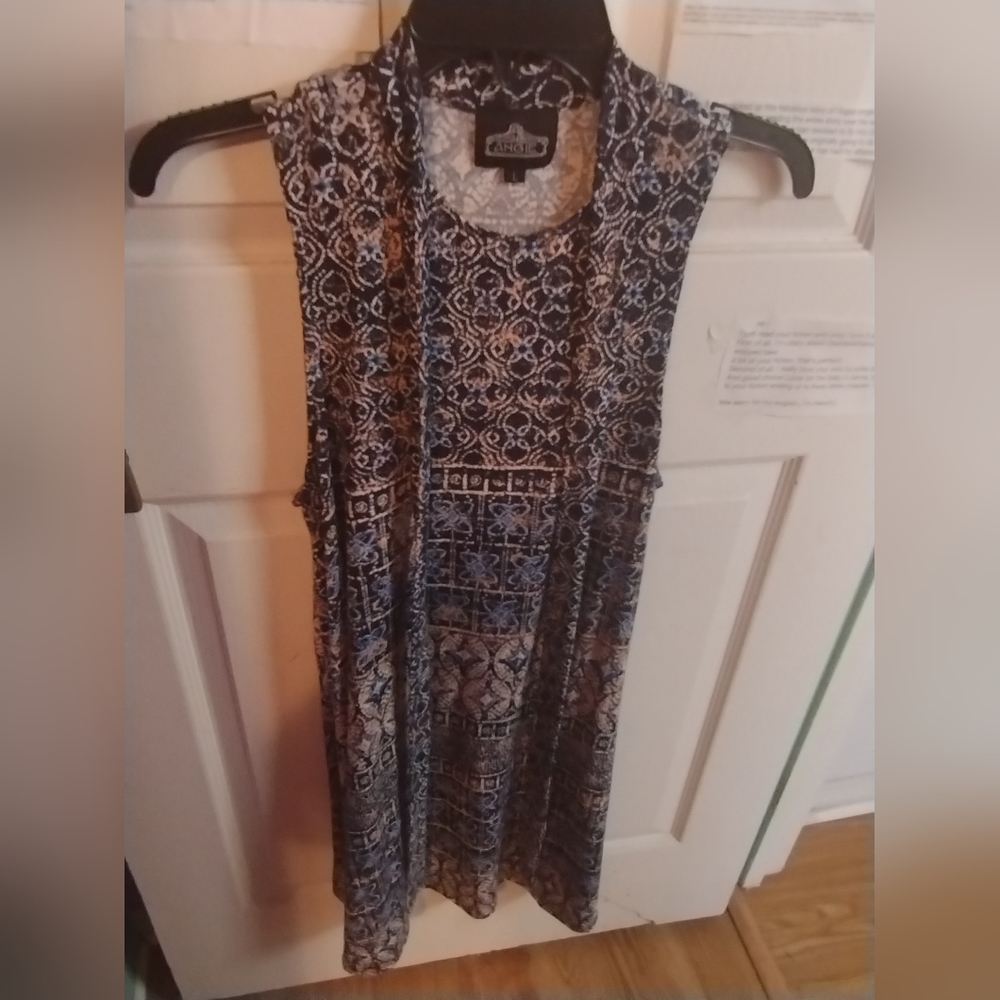 Blue dress with swirl design.